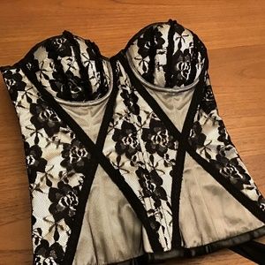 Corset steel-boned. White/silver satin and black lace overbust